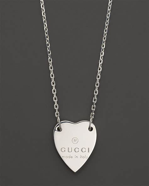 gucci heart necklace with gucci trademark|Gucci love heart necklace.